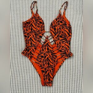 NWT XOXO Wild Side Strappy Cutout Orange and Black Patterned Swimsuit M